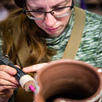 Doug Fitch and Hannah McAndrew making a jug for me